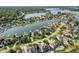 Picturesque aerial shot of waterfront homes on a lake, each with private access and scenic views at 13499 Marjac Way, Fishers, IN 46055
