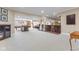 Spacious basement featuring bar with barstools, pool table, and a carpeted floor at 13499 Marjac Way, Fishers, IN 46055