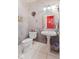 Charming powder room with pedestal sink, decorative mirror, and elegant fixtures at 13499 Marjac Way, Fishers, IN 46055
