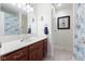 Bathroom featuring a single sink vanity and shower at 13499 Marjac Way, Fishers, IN 46055