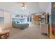 Bright bedroom featuring beach themed decor, ceiling fan, and a sunny window at 13499 Marjac Way, Fishers, IN 46055