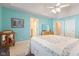 Primary bedroom featuring neutral carpet, tray ceiling, and en suite bathroom access at 13499 Marjac Way, Fishers, IN 46055