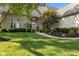 Welcoming front entrance of brick home with manicured landscaping and stone walkway at 13499 Marjac Way, Fishers, IN 46055
