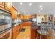 Spacious kitchen with granite countertops, stainless steel appliances, and plenty of cabinet space at 13499 Marjac Way, Fishers, IN 46055