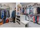 Spacious walk-in closet with custom shelving and ample storage for clothing and accessories at 13499 Marjac Way, Fishers, IN 46055