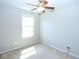 Cozy bedroom with carpet, ceiling fan, and natural light from a large window at 14041 Wimbleton Way, Fishers, IN 46037