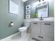 Modern bathroom with sleek vanity, updated fixtures, and fresh paint at 1634 Muessing Rd, Indianapolis, IN 46239