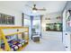 Cheerful bedroom with a bunk bed, a seating area, and a decorative fish tank at 1634 Muessing Rd, Indianapolis, IN 46239