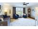 Inviting living room showcasing comfortable seating, neutral decor, and lots of natural light at 1634 Muessing Rd, Indianapolis, IN 46239