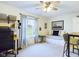 Versatile home office with daybed, desk, and chair setup in a naturally lit space at 1634 Muessing Rd, Indianapolis, IN 46239