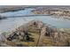 Breathtaking aerial perspective showcasing a lakeside residence with sprawling grounds and stunning water views at 18 Point Ln, Arcadia, IN 46030