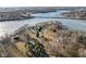 Wonderful aerial capture of a charming lakeside community with beautiful waterfront estates at 18 Point Ln, Arcadia, IN 46030