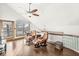 Bonus room boasts wood floors, lake views, vaulted ceilings, and ceiling fan at 18 Point Ln, Arcadia, IN 46030