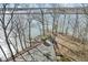 Inviting waterfront deck with tranquil views, providing a seamless blend of indoor-outdoor living at 18 Point Ln, Arcadia, IN 46030
