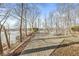 Large backyard deck overlooking the water offers tranquil views and ample space at 18 Point Ln, Arcadia, IN 46030