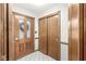 Entryway with a decorative glass door, tile flooring and closet storage at 18 Point Ln, Arcadia, IN 46030