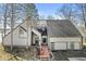 Attractive contemporary home with sleek lines, a two-car garage, and charming front deck at 18 Point Ln, Arcadia, IN 46030