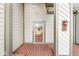 Front door with sidelight, overhead light, and a mail box at 18 Point Ln, Arcadia, IN 46030