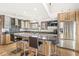 Kitchen with stainless steel appliances, granite countertops, and island with seating at 18 Point Ln, Arcadia, IN 46030
