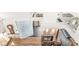 Open-concept living room featuring glass block wall, fireplace, and wood floors at 18 Point Ln, Arcadia, IN 46030