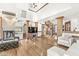 Expansive living room with wooden floors, fireplace, spiral staircase and natural light at 18 Point Ln, Arcadia, IN 46030