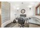 Comfortable office area with unique glass block window and decorative wall sconces at 18 Point Ln, Arcadia, IN 46030