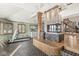Spacious recreation room with fireplace, gym equipment, and beautiful architecture at 18 Point Ln, Arcadia, IN 46030