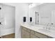 Bright bathroom features a double sink vanity with plenty of storage and a separate shower at 1935 Ponsonby Dr, Westfield, IN 46074