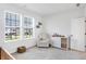 Cozy Bedroom featuring a plush rocking chair, drawers and toys at 1935 Ponsonby Dr, Westfield, IN 46074