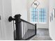 Staircase with contemporary black railings and a view from the top looking down at 1935 Ponsonby Dr, Westfield, IN 46074