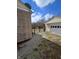 Exterior view of gated backyard offering a secure space for outdoor enjoyment and privacy at 2006 Medford Ave, Indianapolis, IN 46222
