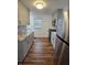 Modern kitchen features stainless steel appliances, updated cabinets, and granite countertops at 2006 Medford Ave, Indianapolis, IN 46222