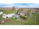 Aerial view showcasing home and outbuildings and green space at 2141 E County Road 200 N, Danville, IN 46122