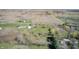 Aerial view showcasing the property and surrounding fields at 2141 E County Road 200 N, Danville, IN 46122