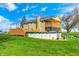 Inviting backyard featuring an above-ground pool and a spacious deck perfect for outdoor entertaining at 2141 E County Road 200 N, Danville, IN 46122