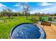 Aerial view of an above ground pool, large grass area, and a storage container on property at 2141 E County Road 200 N, Danville, IN 46122