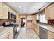 Functional kitchen featuring stainless steel appliances, plenty of counter space, and a practical layout at 2141 E County Road 200 N, Danville, IN 46122