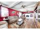 Comfortable living room featuring hardwood floors, large windows, and a cozy atmosphere, perfect for relaxing at 2141 E County Road 200 N, Danville, IN 46122