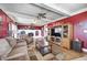 Bright living room features a charming fireplace, hardwood floors, and comfortable seating, creating a cozy atmosphere at 2141 E County Road 200 N, Danville, IN 46122