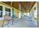 Charming patio with a wood plank ceiling and comfortable seating, great for relaxation at 2141 E County Road 200 N, Danville, IN 46122