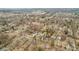 Bird's eye view of a residential neighborhood with tree-lined streets at 2253 W Coil St, Indianapolis, IN 46260