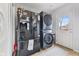 Spacious laundry room includes modern appliances and easy access to the backyard at 2253 W Coil St, Indianapolis, IN 46260