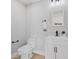 Stylish powder room with a modern vanity, sleek fixtures, and contemporary design at 2406 Carrollton Ave, Indianapolis, IN 46205