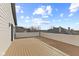 Wood plank deck overlooking a residential neighborhood with cloudy skies at 2406 Carrollton Ave, Indianapolis, IN 46205