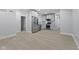 Open floor plan featuring a modern kitchen with stainless steel appliances at 2406 Carrollton Ave, Indianapolis, IN 46205
