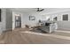 Cozy living room with hardwood floors, neutral colors, and a view of the outside at 2406 Carrollton Ave, Indianapolis, IN 46205