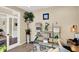 Cozy home office with decorative shelving, ample natural light, and comfortable workspace at 2504 Boylston Ct, Zionsville, IN 46077
