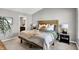 Main bedroom with a view to the main bath at 3046 W New York St, Indianapolis, IN 46222