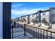 View of the community shows rows of newly constructed homes from the balcony at 3046 W New York St, Indianapolis, IN 46222