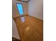 Bedroom with wood flooring and window providing plenty of natural light at 3336 Fall Valley Dr, Columbus, IN 47203